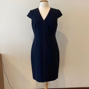 Navy blue with black piping. Ellie Tahari dress . Zip in back to below waist